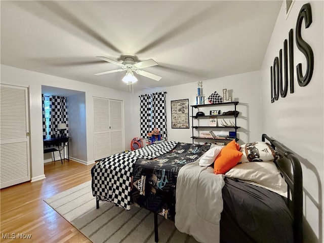 21 Ashwood Dr, Vienna, WV 26105 - bedroom featuring wood finished floors, baseboards, and ceiling fan