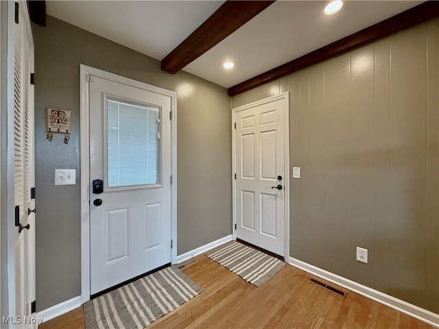 21 Ashwood Dr, Vienna, WV 26105 - foyer entrance featuring beam ceiling, light wood-type flooring, baseboards, and recessed lighting