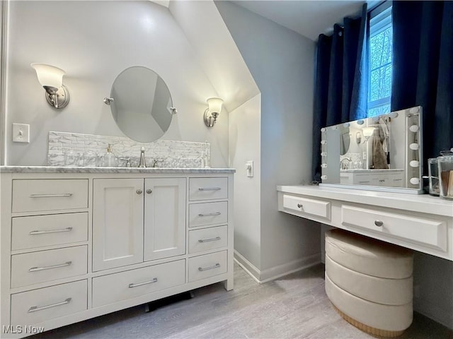 21 Ashwood Dr, Vienna, WV 26105 - bathroom featuring wood finished floors, baseboards, and vanity
