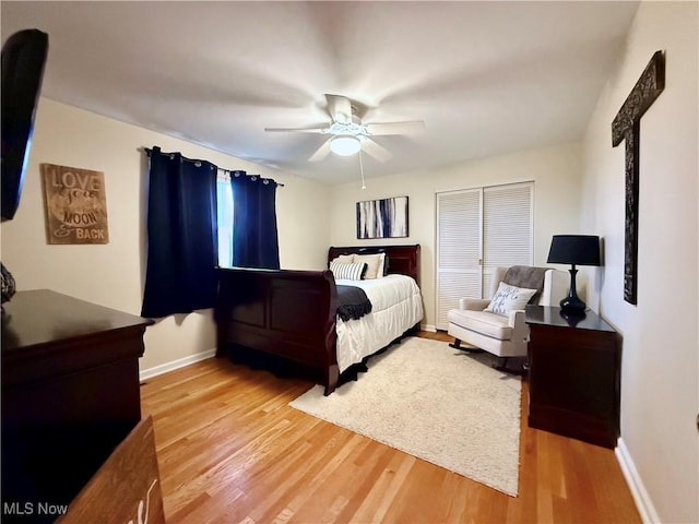 21 Ashwood Dr, Vienna, WV 26105 - bedroom with light wood-style flooring, baseboards, and ceiling fan
