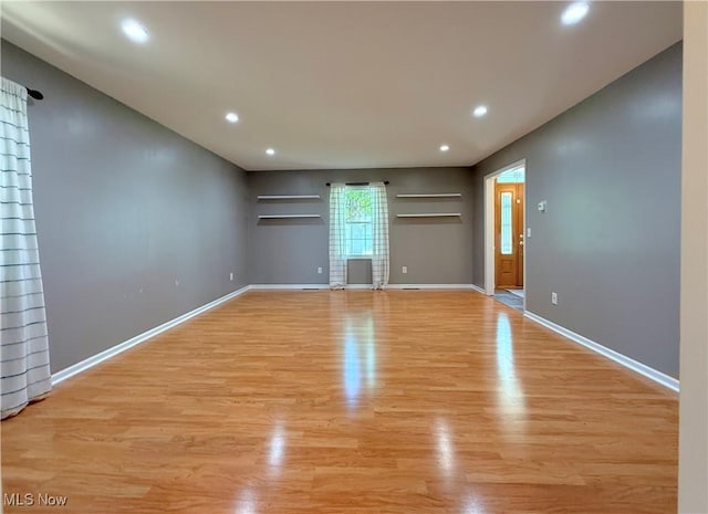 21 Ashwood Dr, Vienna, WV 26105 - spare room featuring recessed lighting, light wood-style floors, and baseboards