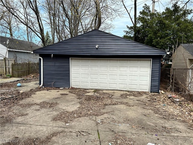 detached garage with fence