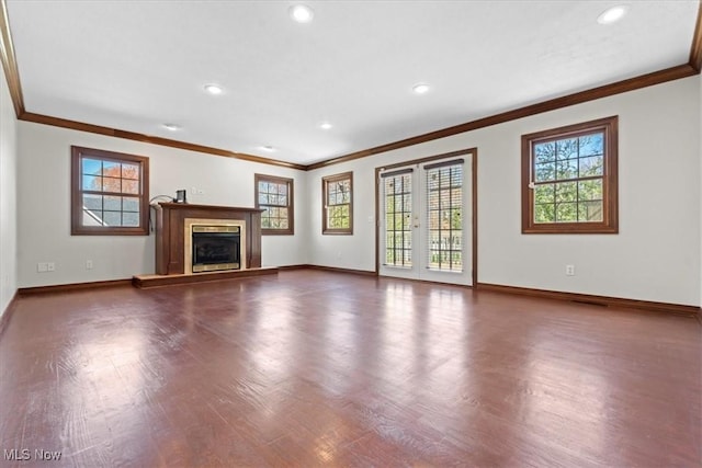 5215 Glenbrook Dr, Vienna, WV 26105 - unfurnished living room with ornamental molding, wood finished floors, and plenty of natural light