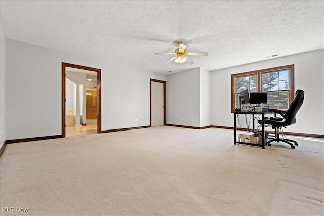 5215 Glenbrook Dr, Vienna, WV 26105 - unfurnished office with a textured ceiling, baseboards, ceiling fan, and light colored carpet