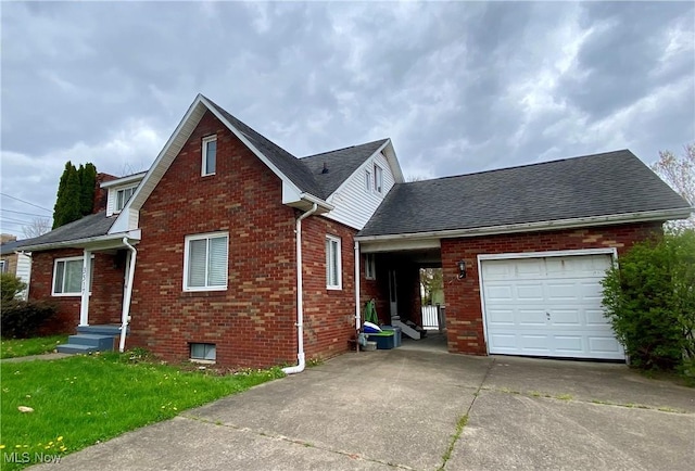 traditional home with concrete driveway, an attached garage, a front yard, brick siding, and a shingled roof