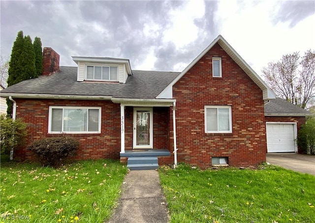 view of front of home featuring brick siding, driveway, a chimney, and a front lawn