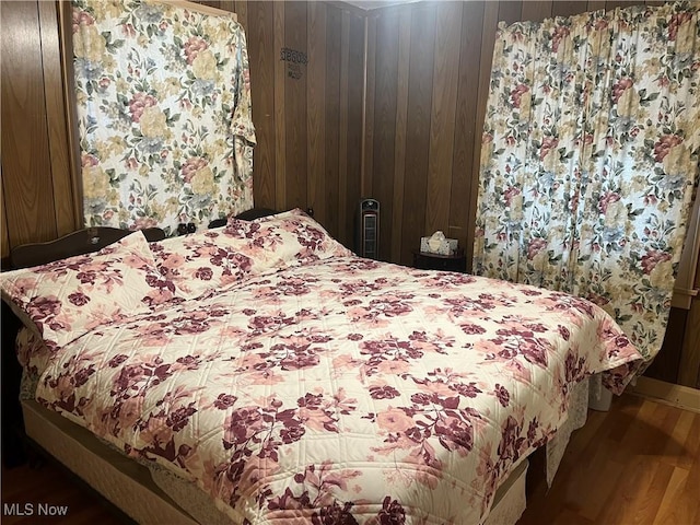 152 Regent St, Youngstown, OH 44507 - bedroom featuring wood walls and wood finished floors