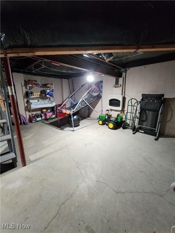 7180 E Wheeling Rd, Zanesville, OH 43701 - unfinished basement with concrete block wall