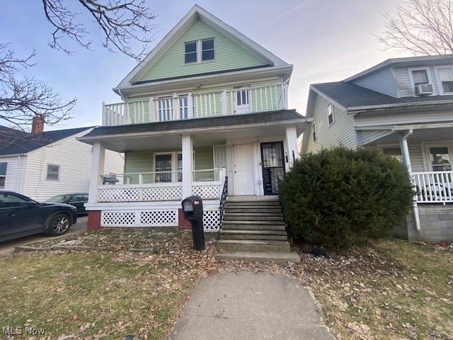 view of front of house featuring covered porch and cooling unit
