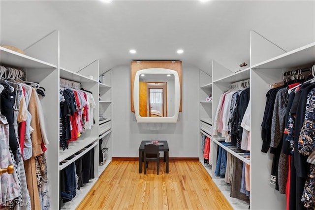 spacious closet featuring light wood-style floors