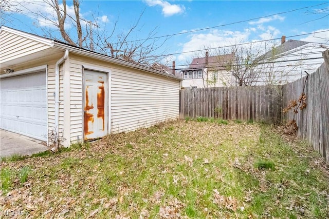 garage with fence