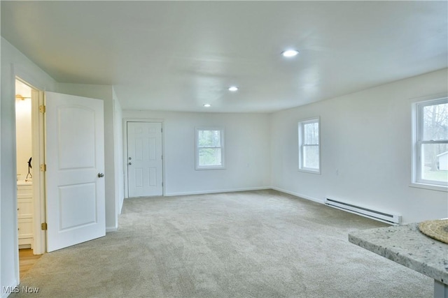 5099 Norquest Blvd, Youngstown, OH 44515 - carpeted spare room featuring a baseboard radiator, a healthy amount of sunlight, baseboards, and recessed lighting