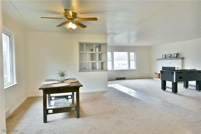 5099 Norquest Blvd, Youngstown, OH 44515 - playroom featuring a ceiling fan, carpet, a fireplace, baseboards, and visible vents