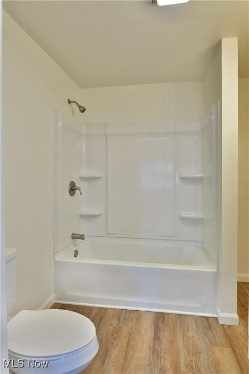 5099 Norquest Blvd, Youngstown, OH 44515 - full bathroom featuring wood finished floors, toilet, baseboards, and bathtub / shower combination