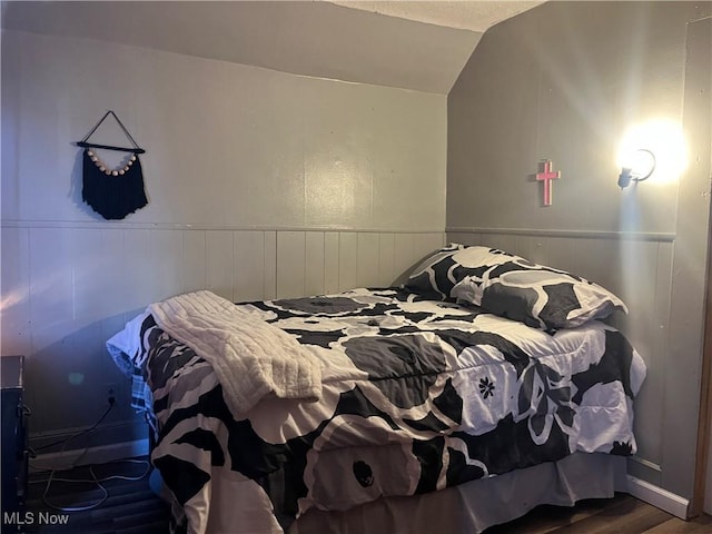 1641 Sharon Ave, Zanesville, OH 43701 - bedroom with lofted ceiling, wood finished floors, and wainscoting