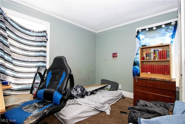 carpeted bedroom featuring baseboards and crown molding