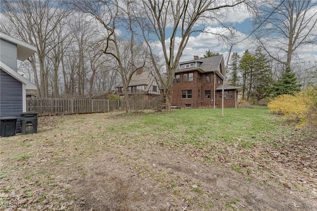 view of yard with fence