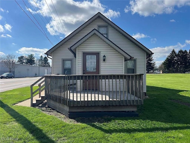7431 Middlebranch Ave NE, Canton, OH 44721 - back of house with a wooden deck and a lawn