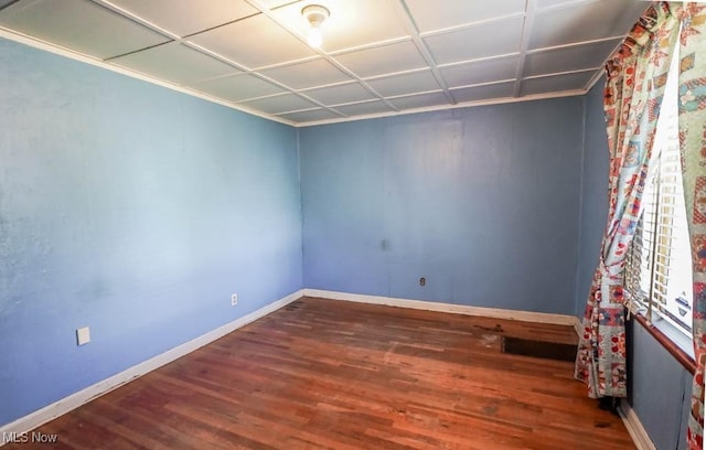 2104 Tanner Ave SW, Canton, OH 44706 - unfurnished room featuring baseboards and wood finished floors