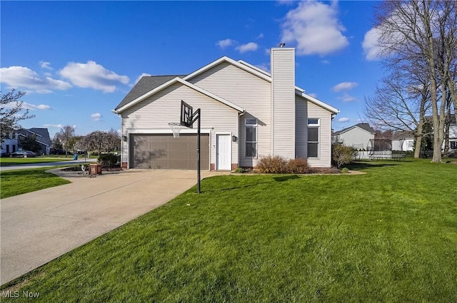 exterior space with an attached garage, a chimney, a front yard, and concrete driveway