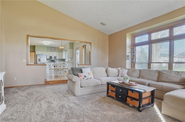 carpeted living room with lofted ceiling, visible vents, baseboards, a textured ceiling, and a notable chandelier