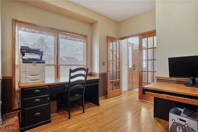 office area featuring french doors and light wood-type flooring