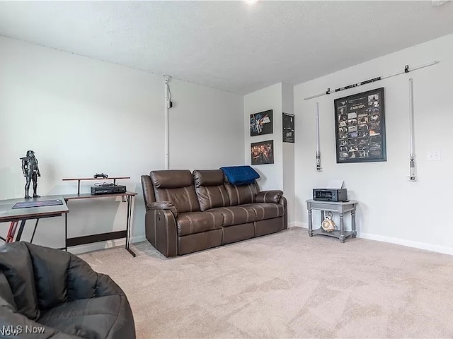 living area featuring carpet floors and baseboards