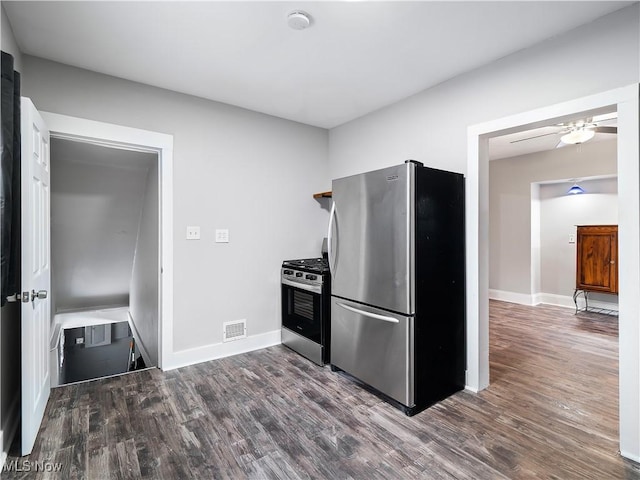 1821 Kenneth Ave, Cleveland, OH 44109 - kitchen with dark wood-type flooring, visible vents, baseboards, and stainless steel appliances