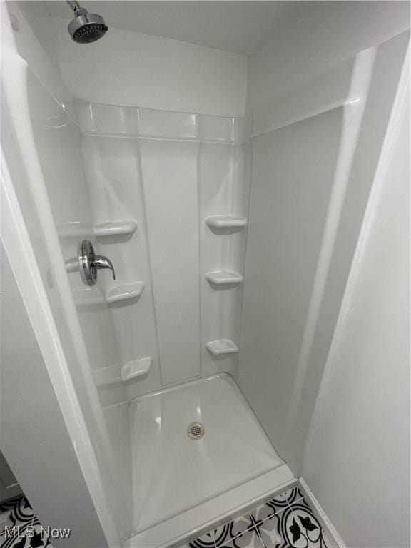 bathroom with a shower