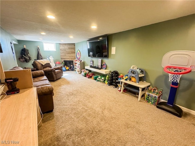 203 57th St, Vienna, WV 26105 - living room featuring a fireplace, carpet, and recessed lighting