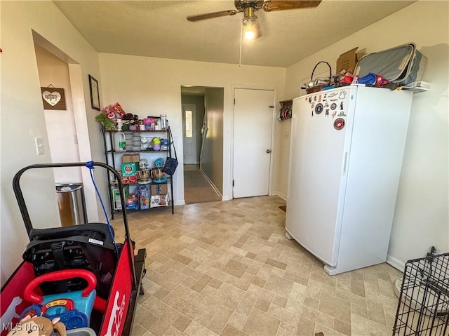203 57th St, Vienna, WV 26105 - interior space featuring ceiling fan and baseboards
