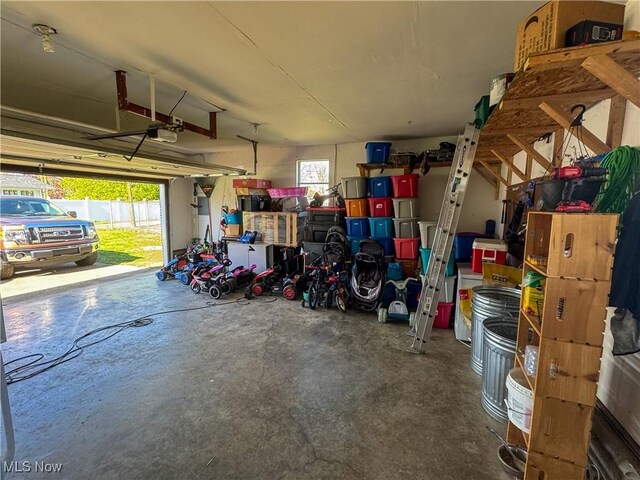 203 57th St, Vienna, WV 26105 - garage with a garage door opener