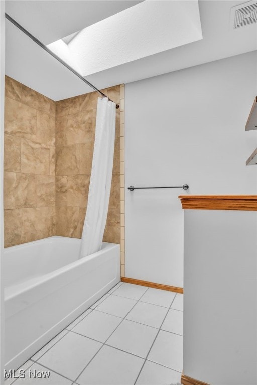 134 Shore Line Ave NW, Canton, OH 44708 - bathroom featuring tile patterned flooring and shower / bath combo with shower curtain