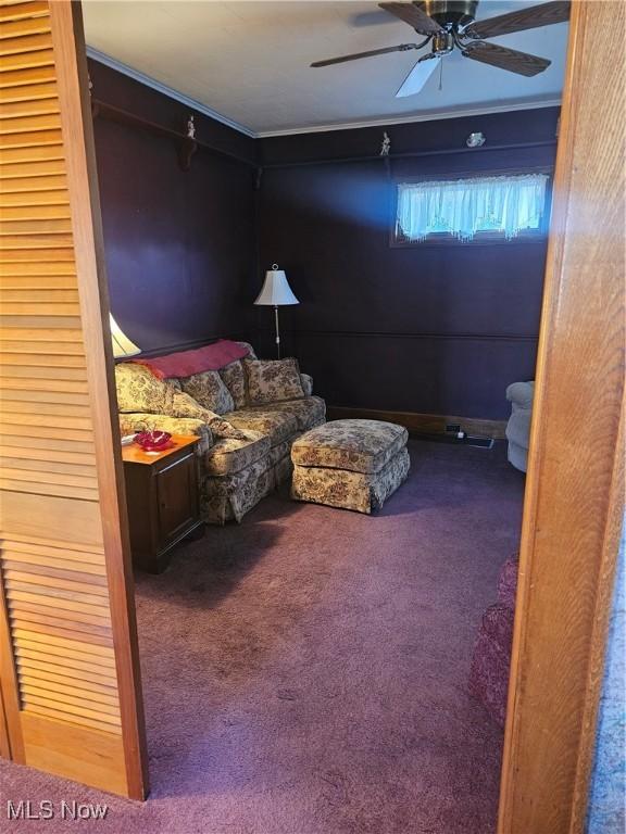445 N 18th St, Sebring, OH 44672 - living area featuring carpet flooring and a ceiling fan