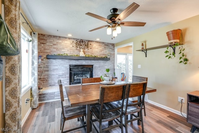 1865 9th St SW, Akron, OH 44314 - dining space featuring a wealth of natural light, a ceiling fan, and baseboards