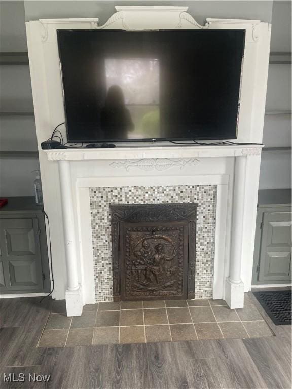 room details with wood finished floors and ornate columns