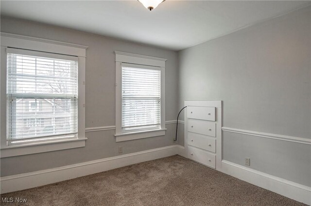 366 Portage St, Wadsworth, OH 44281 - spare room featuring baseboards and carpet flooring