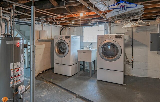 366 Portage St, Wadsworth, OH 44281 - laundry room with water heater, laundry area, a sink, electric panel, and washing machine and clothes dryer