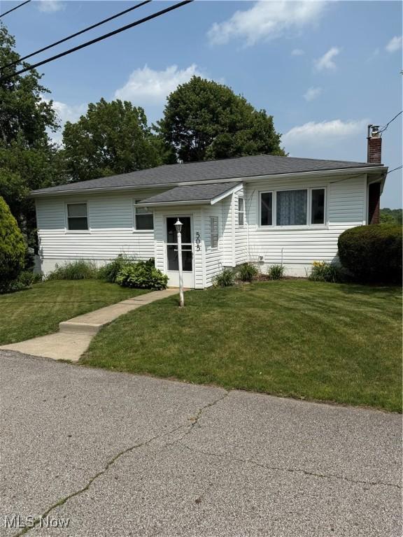 505 Moody St, Akron, OH 44305 - single story home with a front lawn and a chimney