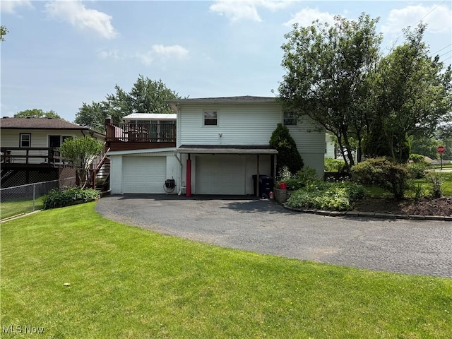 505 Moody St, Akron, OH 44305 - view of front of property featuring a garage, driveway, and a deck