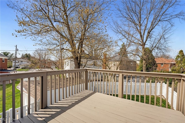 wooden deck featuring a residential view