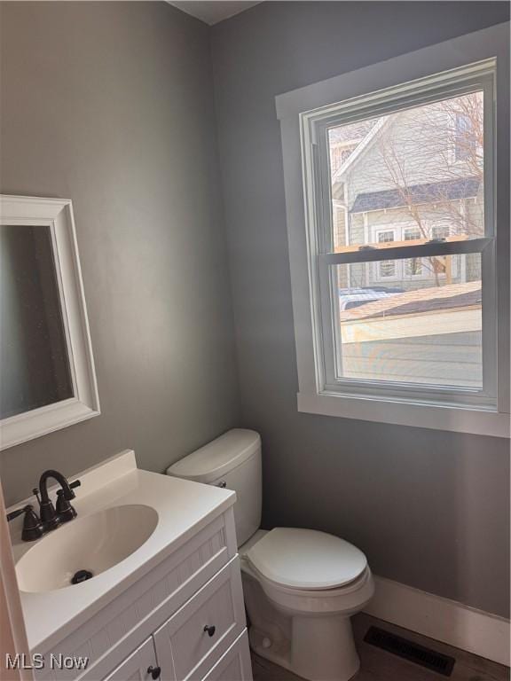 204 N Spring St, Loudonville, OH 44842 - half bathroom with toilet and vanity