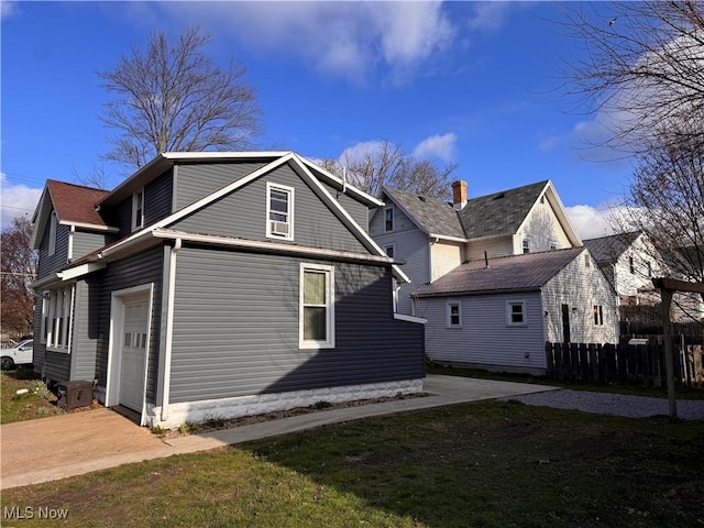 204 N Spring St, Loudonville, OH 44842 - rear view of house with fence