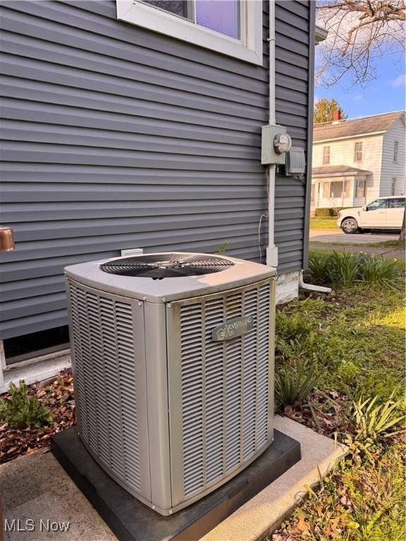 204 N Spring St, Loudonville, OH 44842 - exterior view of central air condition unit