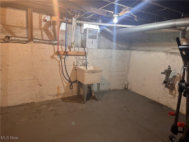 204 N Spring St, Loudonville, OH 44842 - unfinished basement with a sink