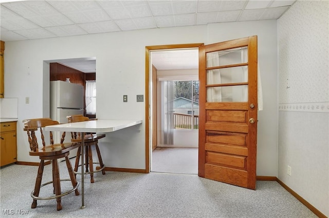 dining space with baseboards