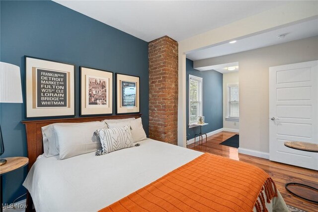 1881 W 65th St, Cleveland, OH 44102 - bedroom featuring wood finished floors and baseboards