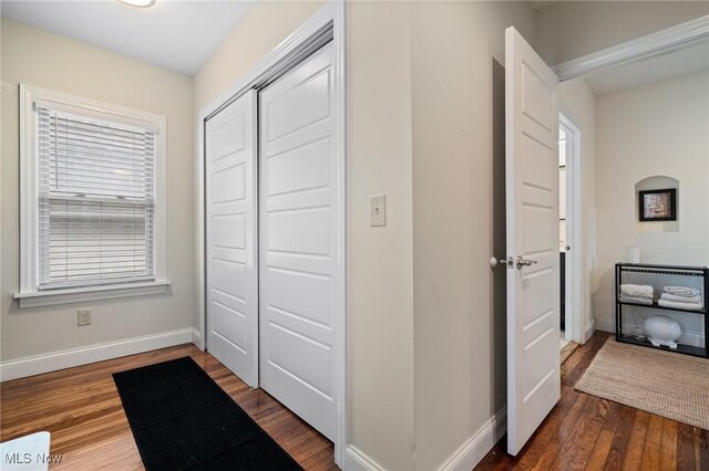 1881 W 65th St, Cleveland, OH 44102 - hall with baseboards and dark wood-style floors