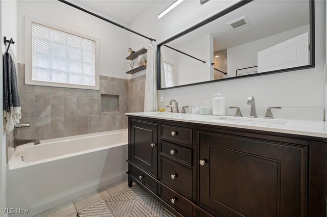 1881 W 65th St, Cleveland, OH 44102 - bathroom with double vanity, tile patterned flooring, and shower / bath combination with curtain