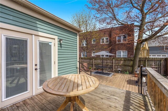1881 W 65th St, Cleveland, OH 44102 - wooden deck featuring outdoor dining area